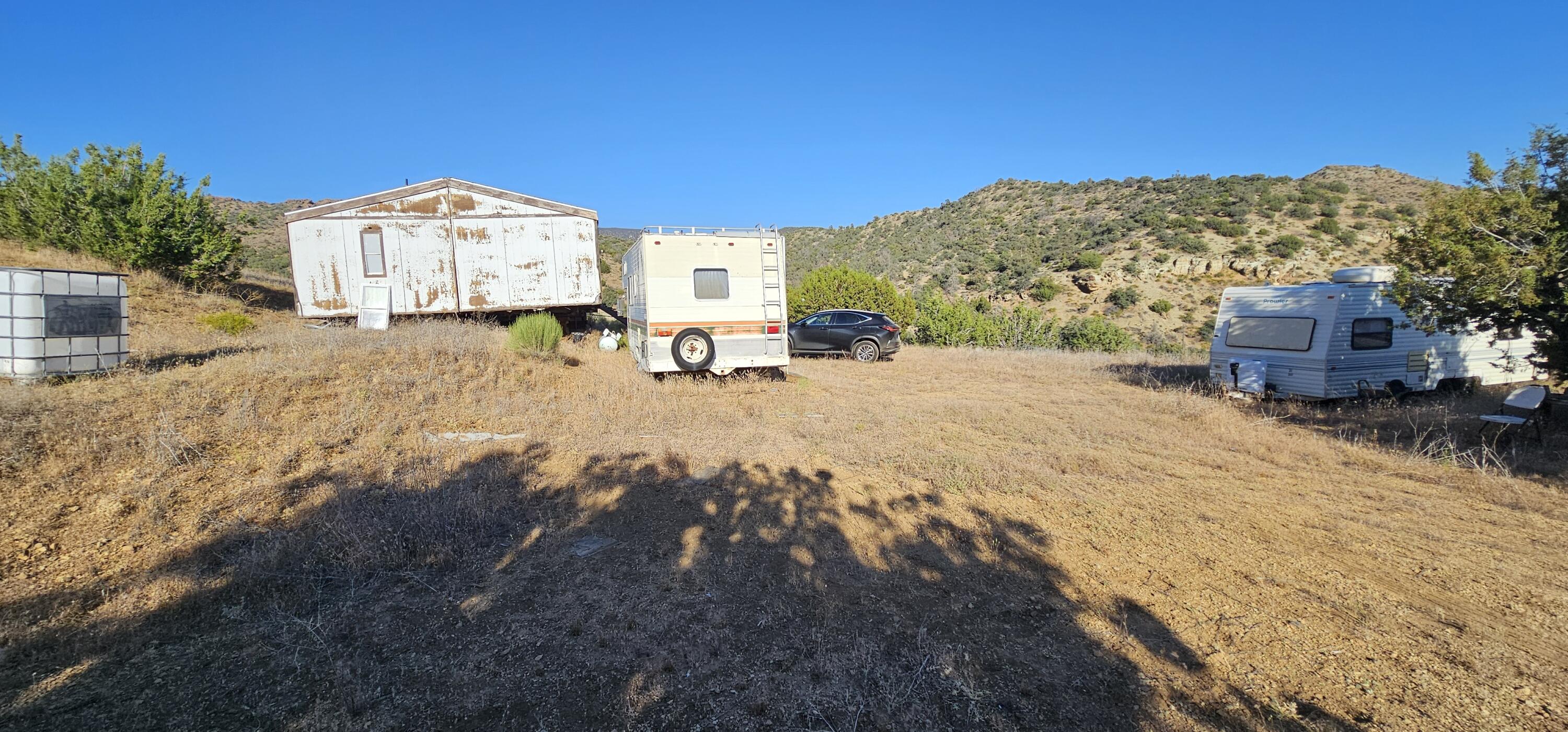 Olympic Way Tehachapi, CA 93561 - Photo 7 of 18 a view of a house with a yard