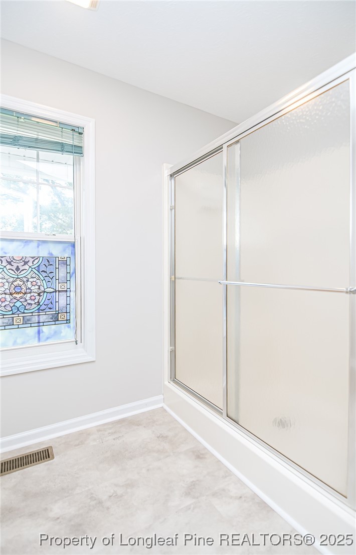 4735 Camden Road Fayetteville, NC 28306 - Photo 12 of 34 a view of an empty room with a window
