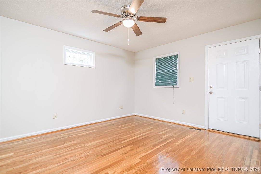 4735 Camden Road Fayetteville, NC 28306 - Photo 8 of 34 wooden floor in an empty room