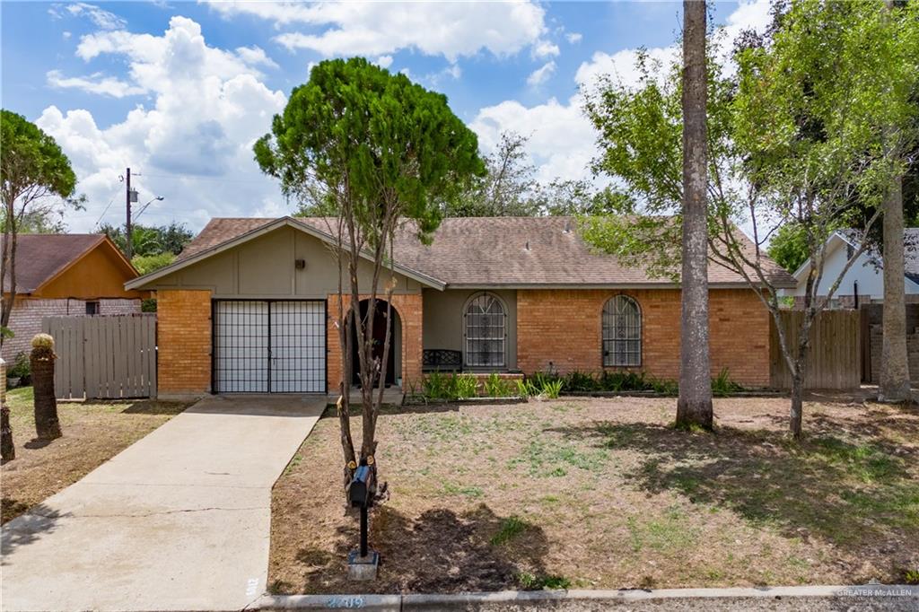 2709 Eagle Avenue McAllen, TX 78504 - Photo 1 of 1 a front view of a house with garden