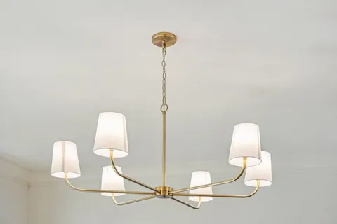 a close view of light fixtures and empty racks