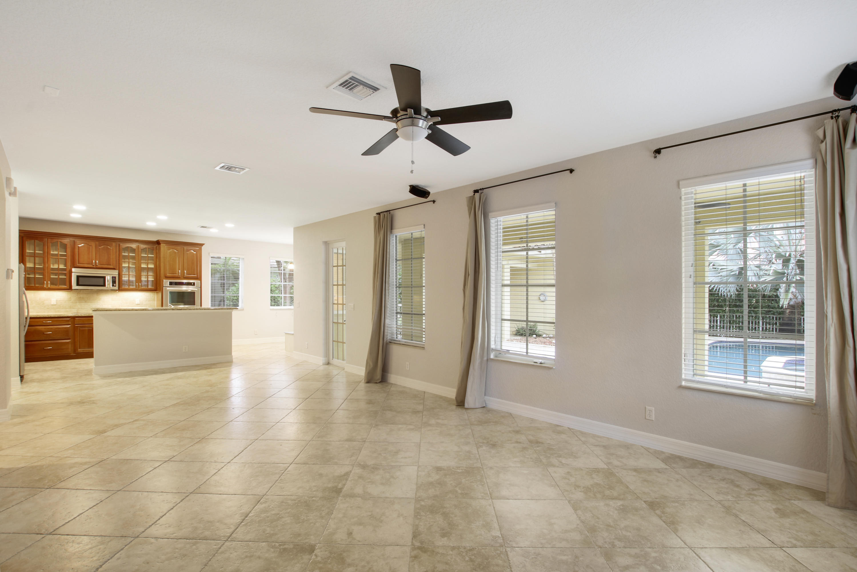 148 Glencullen Circle Jupiter, FL 33458 - Photo 9 of 20 Open Concept Living/Kitchen Area