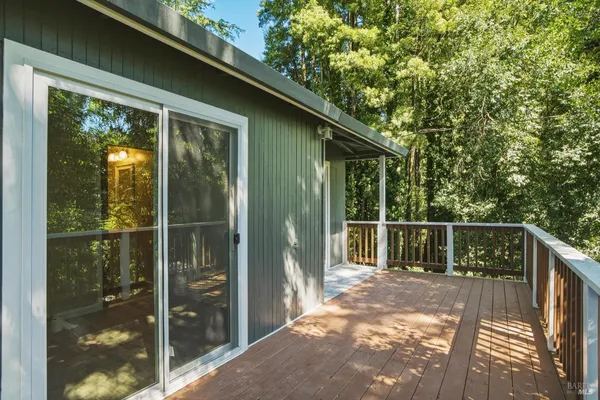 a balcony with a yard