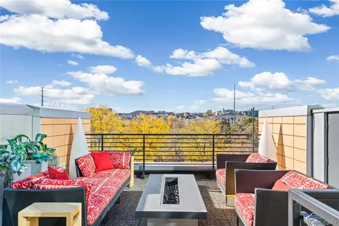 a view of a living room with furniture