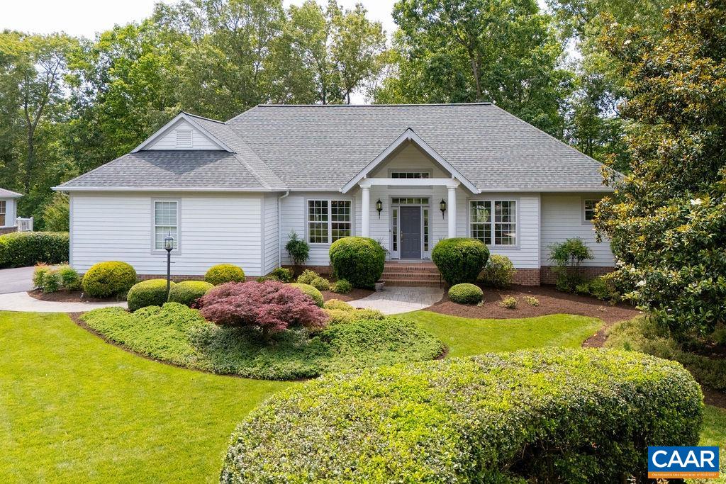 3515 Devon Pines Keswick, VA 22947 - Photo 2 of 68 a view of house with garden and tall trees