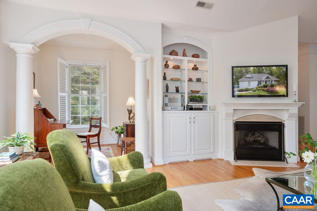 3515 Devon Pines Keswick, VA 22947 - Photo 21 of 68 a living room with furniture a window and a fireplace