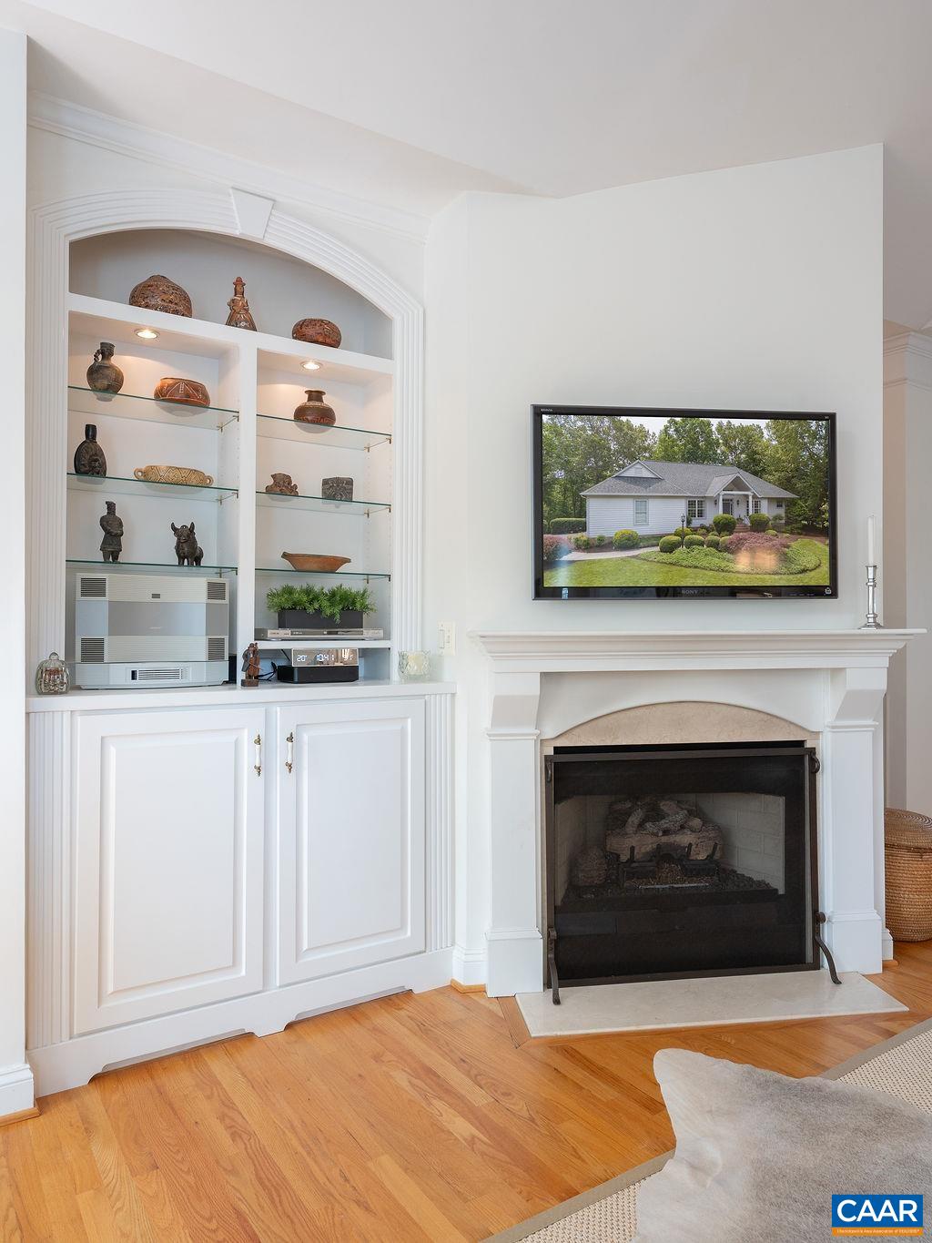 3515 Devon Pines Keswick, VA 22947 - Photo 25 of 68 a view of livingroom with furniture fire place and a fireplace
