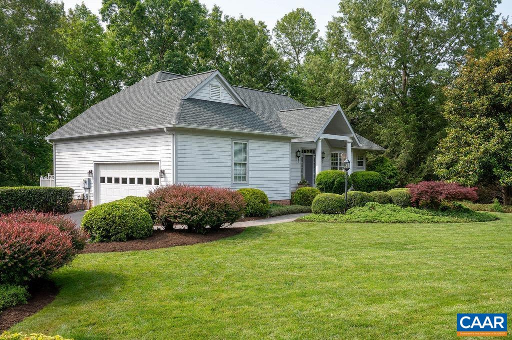 3515 Devon Pines Keswick, VA 22947 - Photo 3 of 68 a front view of a house with a garden