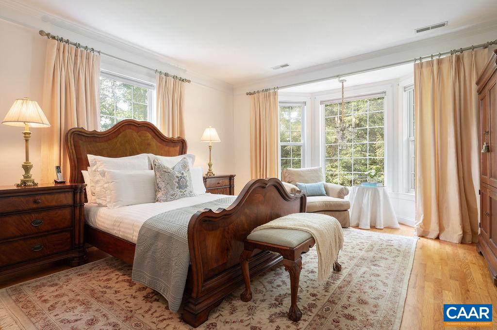 3515 Devon Pines Keswick, VA 22947 - Photo 34 of 68 a bedroom with a bed and a large window