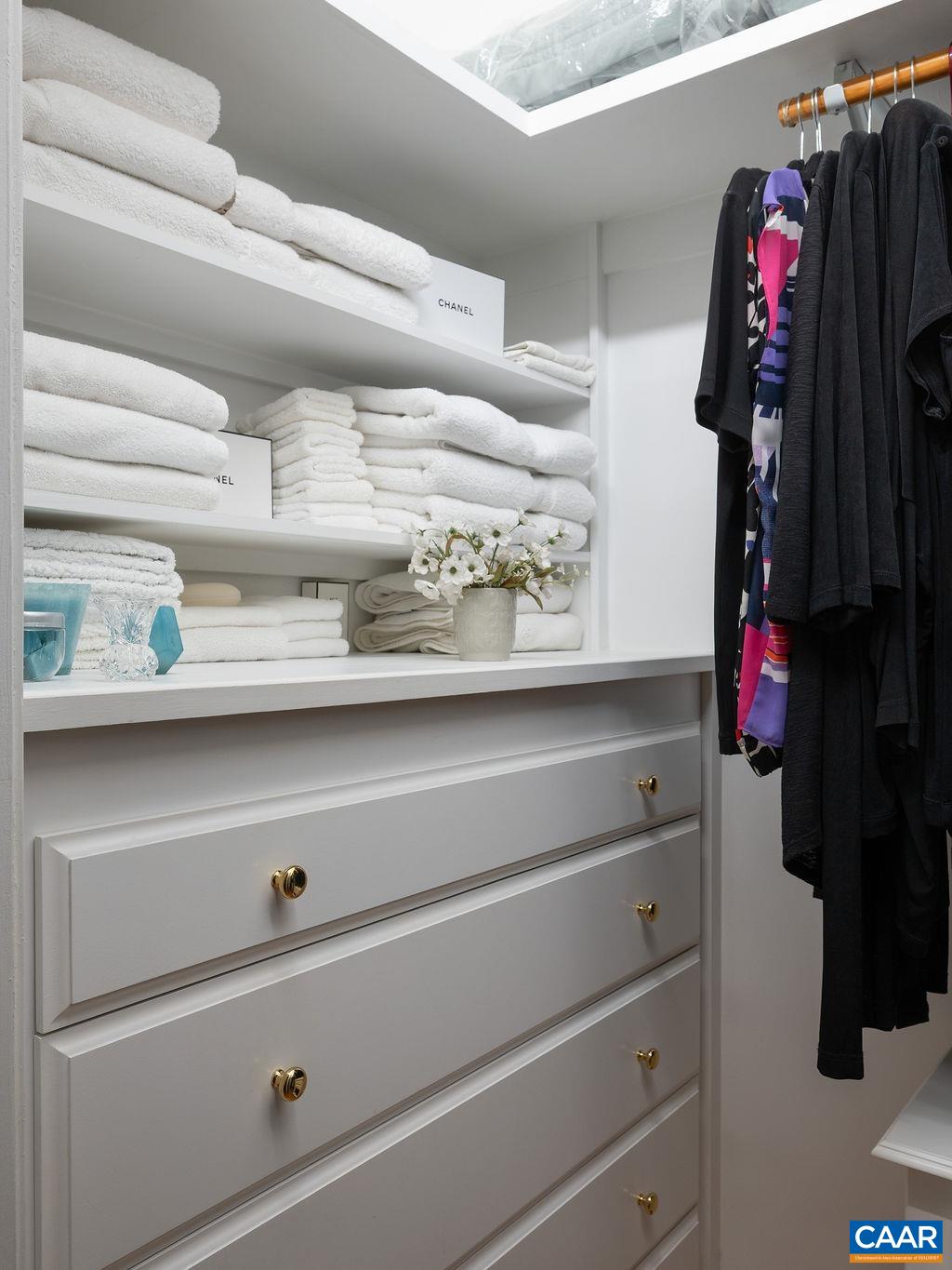 3515 Devon Pines Keswick, VA 22947 - Photo 37 of 68 a view of walk in closet with clothes and shoes