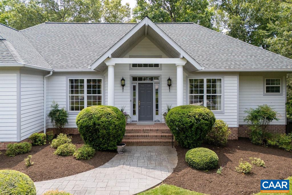 3515 Devon Pines Keswick, VA 22947 - Photo 4 of 68 a front view of a house with garden