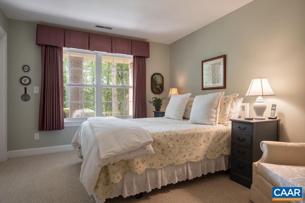 3515 Devon Pines Keswick, VA 22947 - Photo 45 of 68 a bedroom with a bed and a large window
