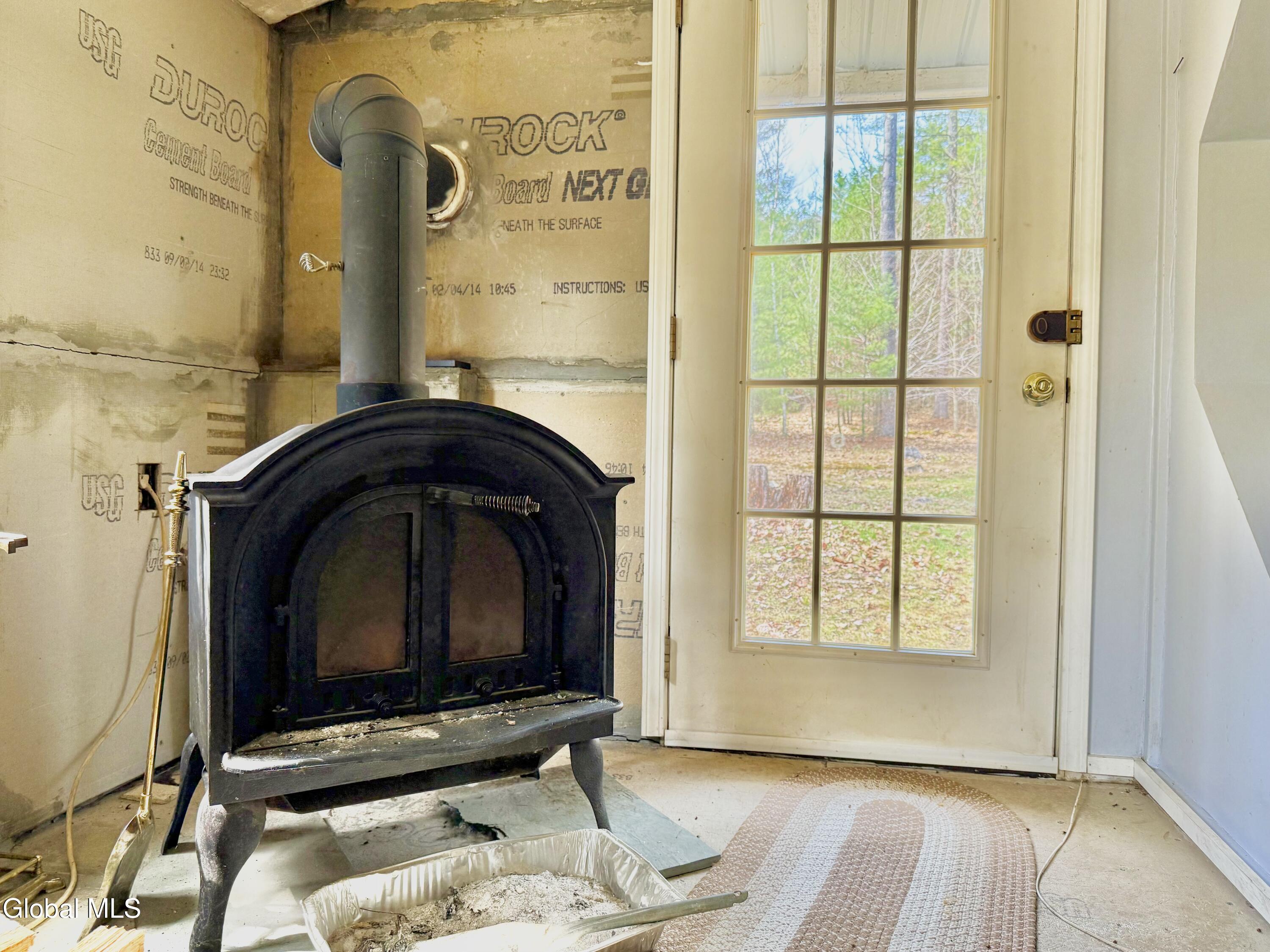 268 Glasshouse Creek Road Day, NY 12835 - Photo 24 of 33 Wood stove close shot