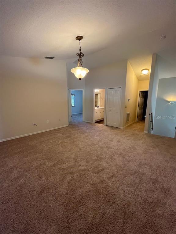 21 Whittingham Lane Palm Coast, FL 32164 - Photo 20 of 34 a view of an empty room with a mirror