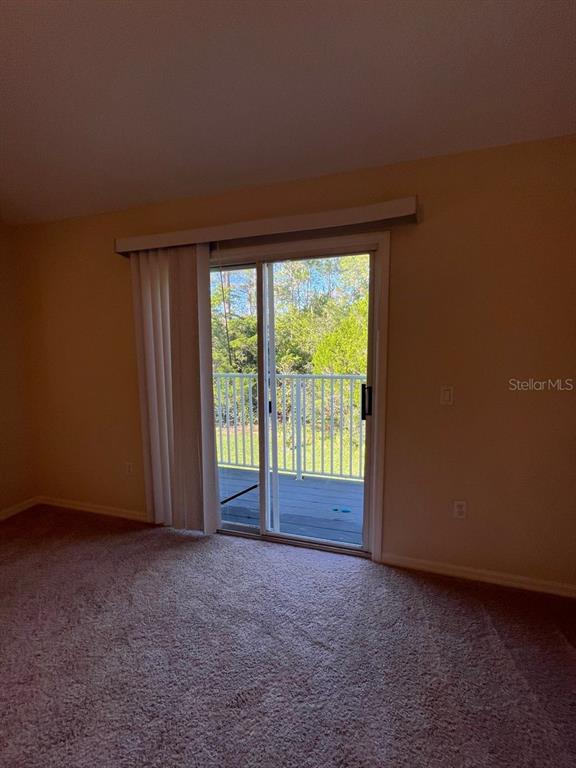 21 Whittingham Lane Palm Coast, FL 32164 - Photo 22 of 34 a view of an empty room with a window