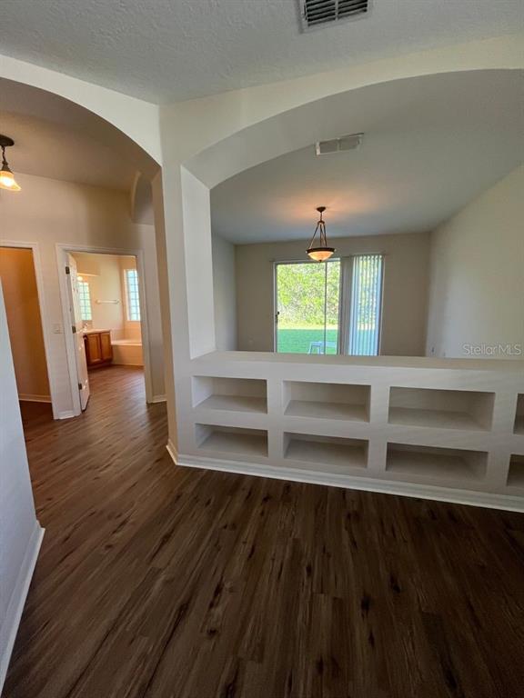 21 Whittingham Lane Palm Coast, FL 32164 - Photo 26 of 34 a view of a hallway view with wooden floor and windows
