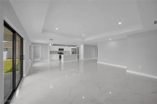 a view of a livingroom with a furniture and a window