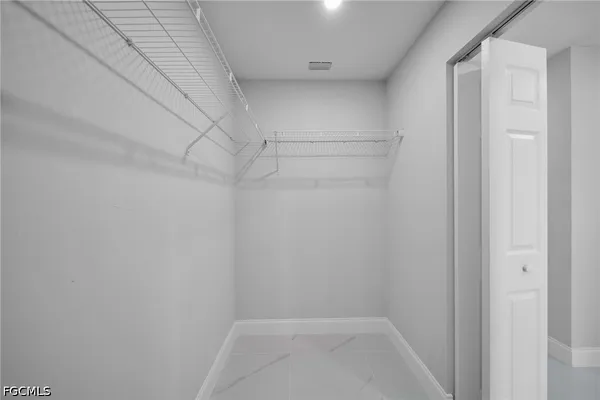 a view of a room with racks on the wall