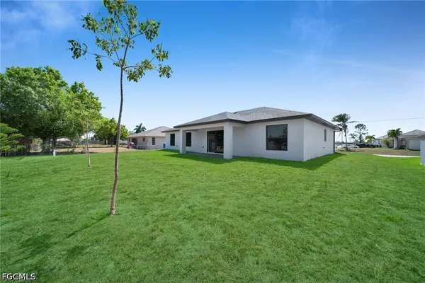 a house view with a garden space