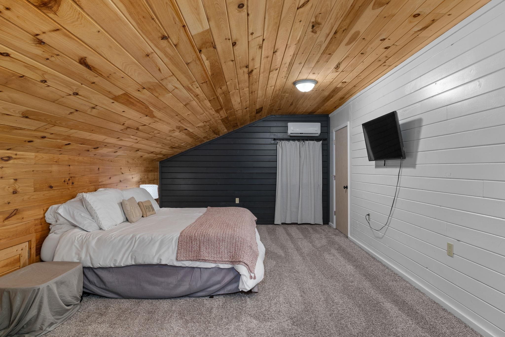 66 County Road 511 Corinth, MS 38834 - Photo 27 of 40 Sloped wood-paneled ceiling with recessed lighting