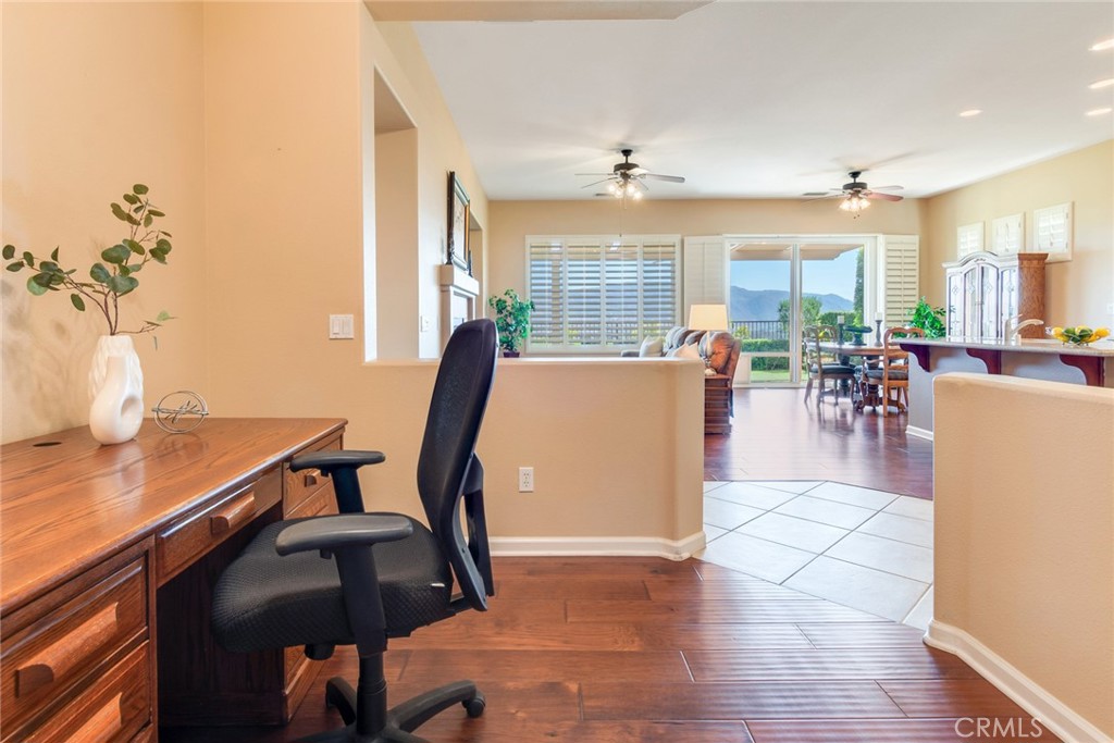 24594 Hatton Lane Corona, CA 92883 - Photo 12 of 57 a view of a dining room with furniture window and outside view