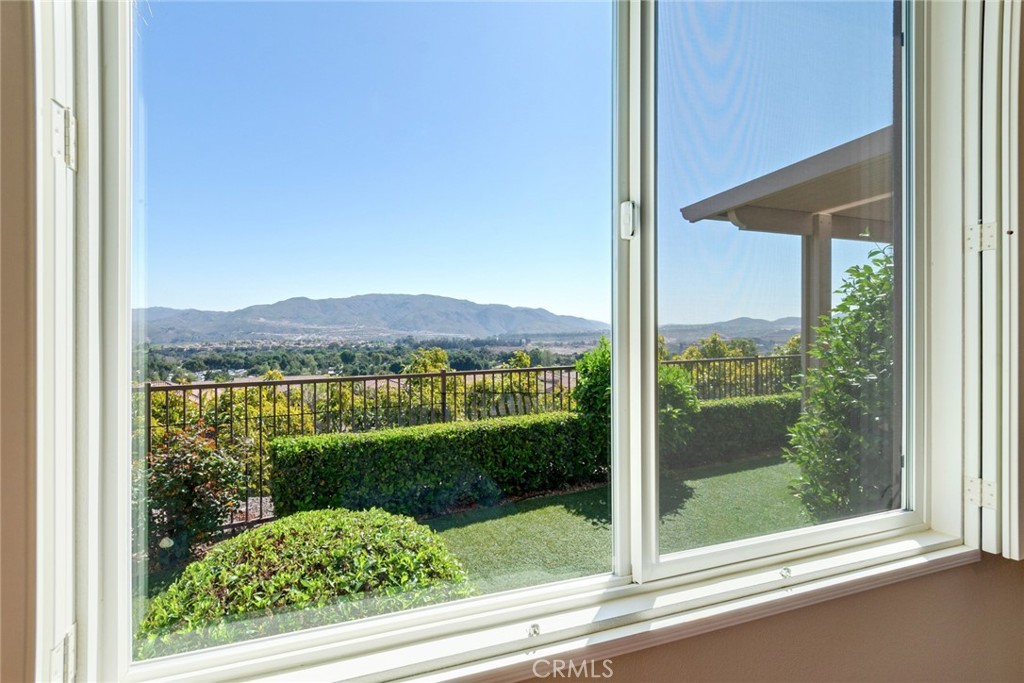 24594 Hatton Lane Corona, CA 92883 - Photo 17 of 57 a view of a glass door and a yard