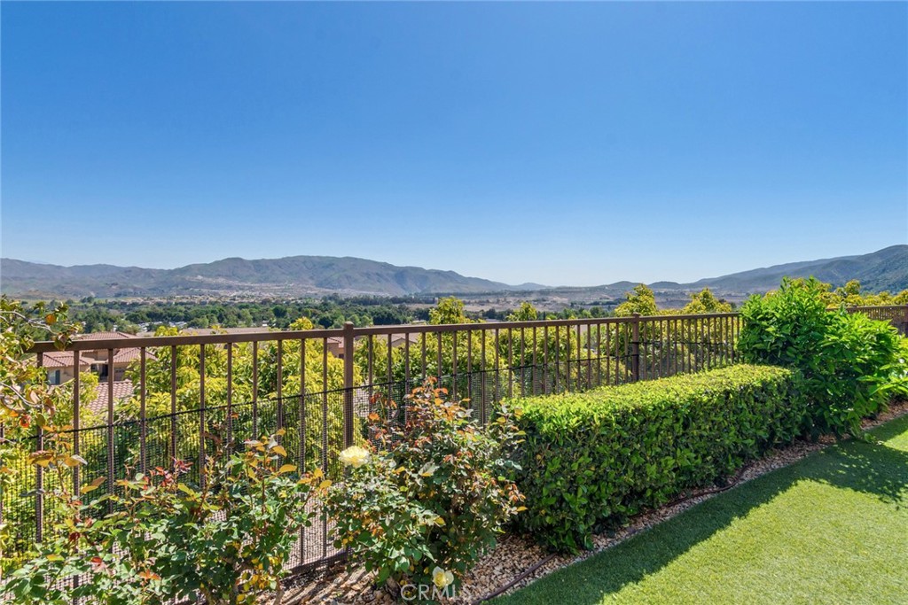 24594 Hatton Lane Corona, CA 92883 - Photo 24 of 57 a view of a lake with a city view