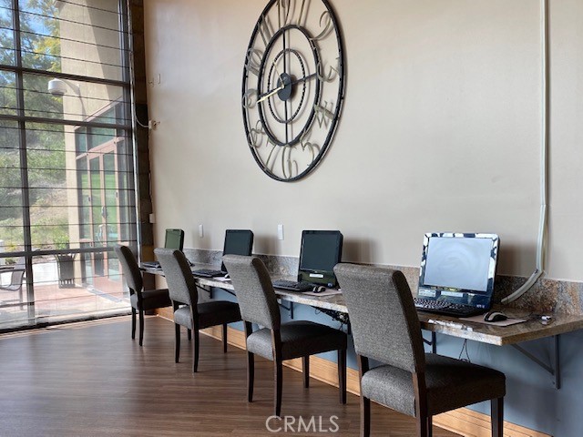 24594 Hatton Lane Corona, CA 92883 - Photo 29 of 57 a view of a dining room with furniture window and wooden floor