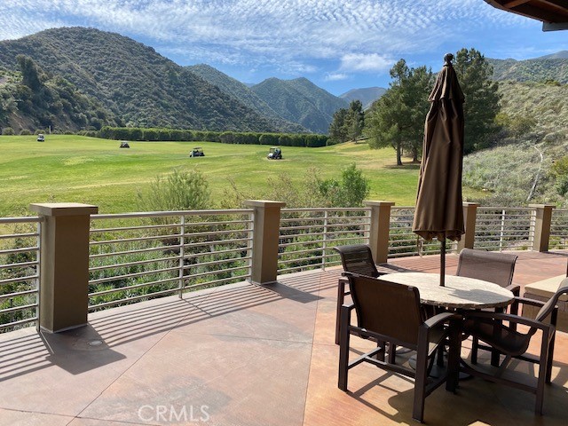 24594 Hatton Lane Corona, CA 92883 - Photo 30 of 57 a view of a chairs and table on the terrace
