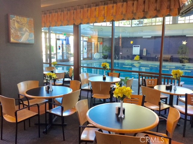 24594 Hatton Lane Corona, CA 92883 - Photo 34 of 57 a dining room with a table and chairs