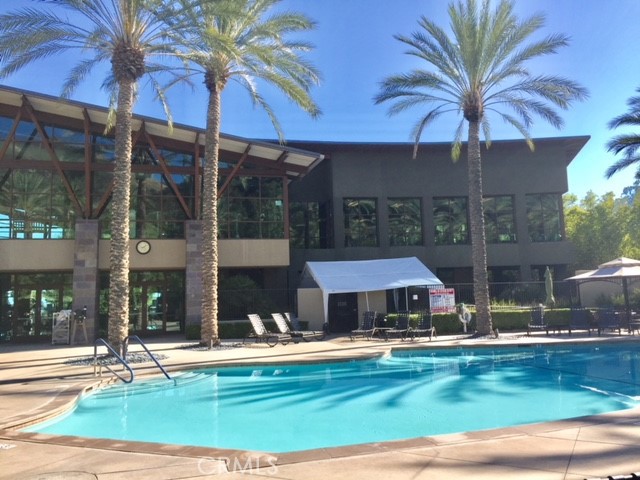 24594 Hatton Lane Corona, CA 92883 - Photo 37 of 57 a view of a swimming pool with a patio