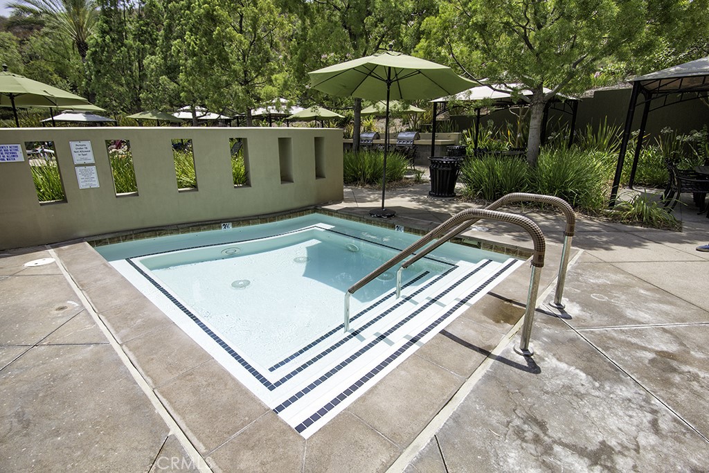 24594 Hatton Lane Corona, CA 92883 - Photo 38 of 57 an outdoor sitting area with furniture
