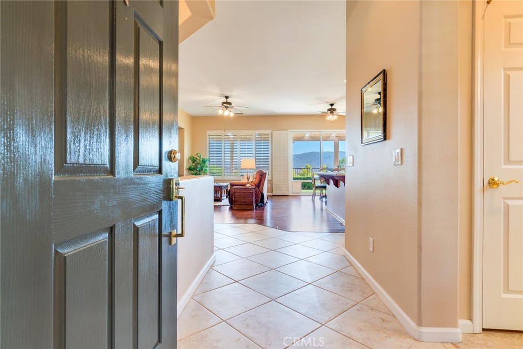 24594 Hatton Lane Corona, CA 92883 - Photo 56 of 57 a lobby with furniture and a potted plant