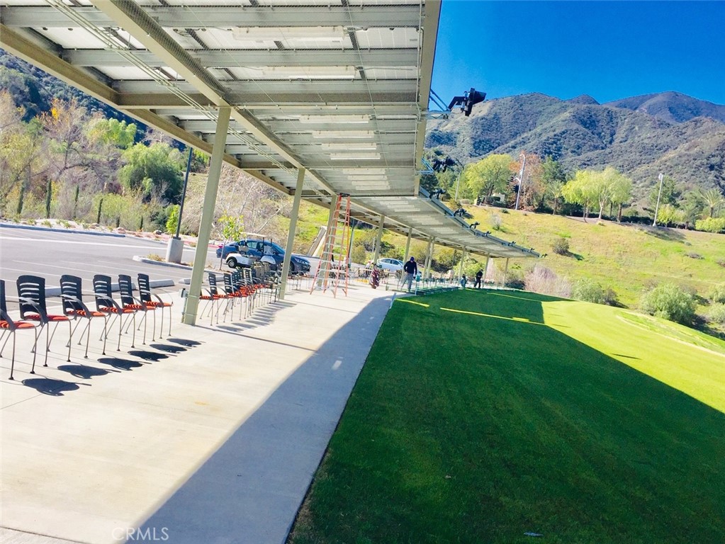 24594 Hatton Lane Corona, CA 92883 - Photo 50 of 57 a view of swimming pool with a patio and mountain view