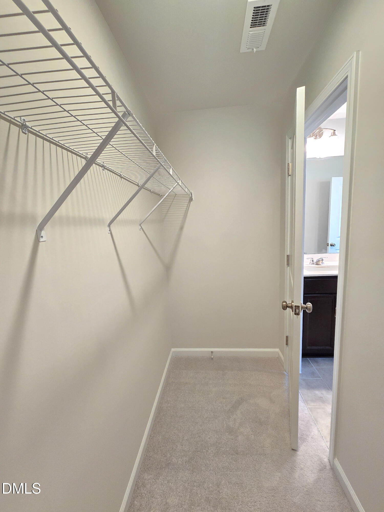 2431 Kasota Lane Raleigh, NC 27610 - Photo 34 of 46 a view of a room with shelf