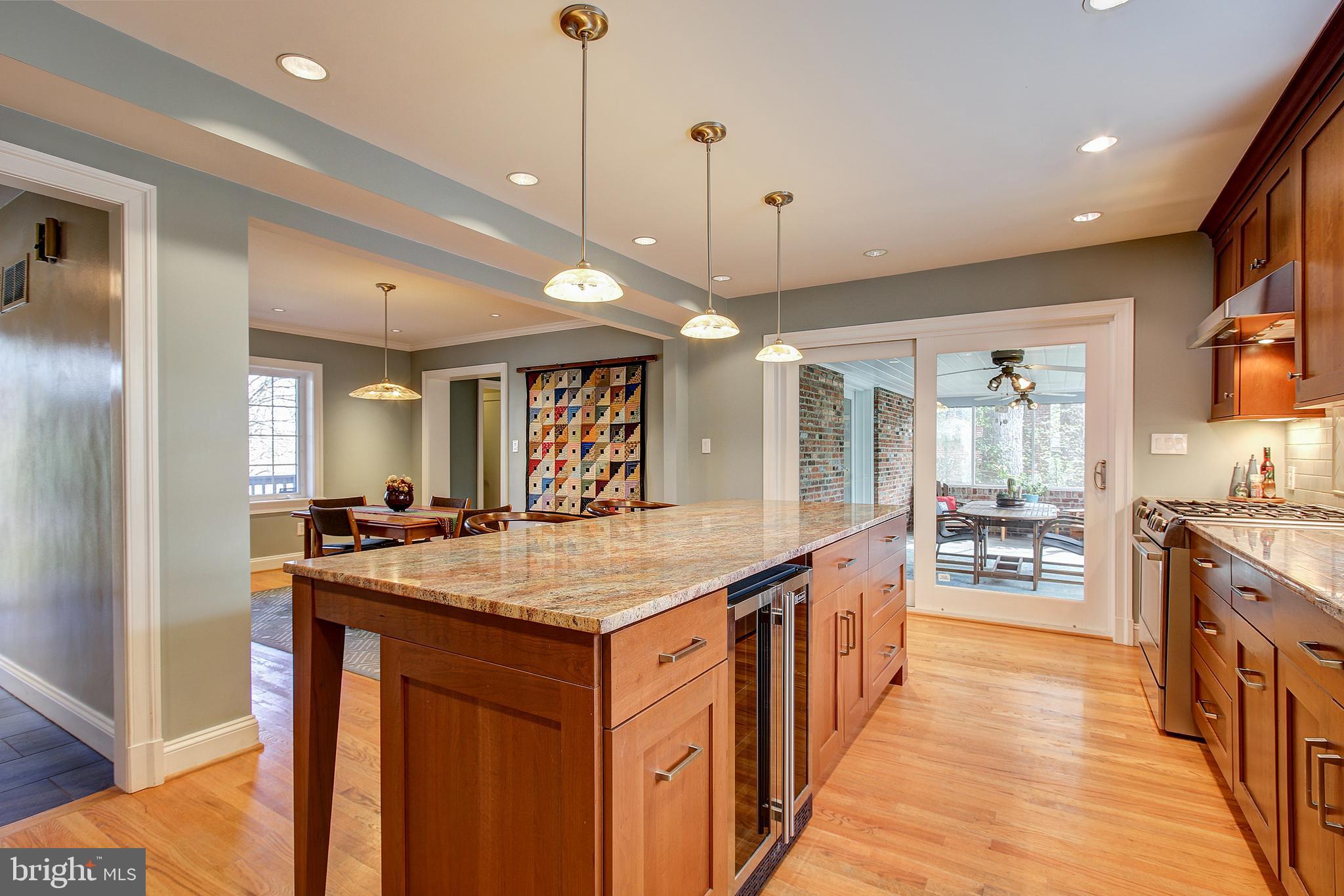 1441 Crestridge Drive Silver Spring, MD 20910 - Photo 13 of 50 Kitchen is open to spacious three seasons room