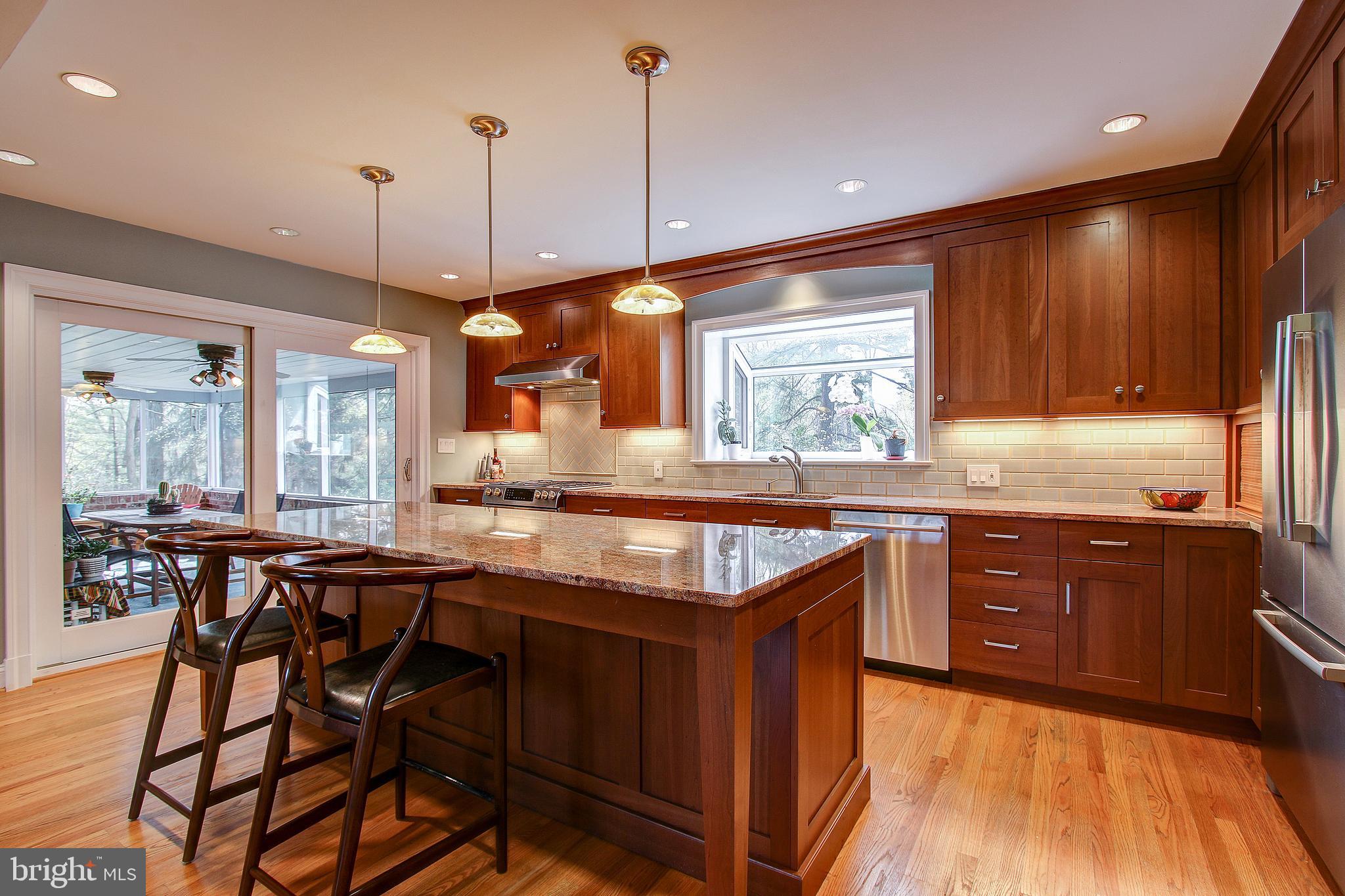 1441 Crestridge Drive Silver Spring, MD 20910 - Photo 14 of 50 Kitchen island with bar seating
