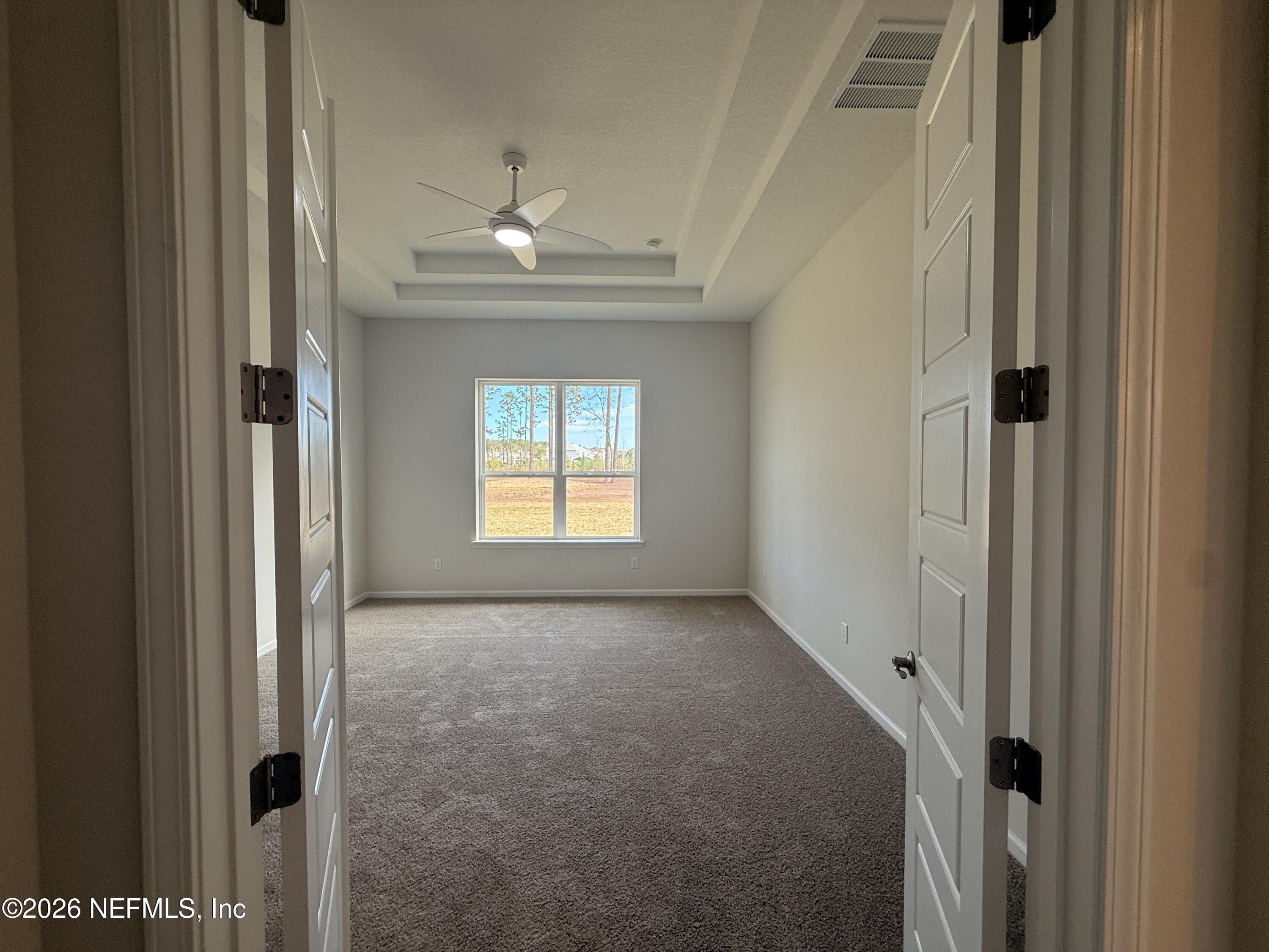95110 Barnwell Road Fernandina Beach, FL 32034 - Photo 15 of 22 a view of an empty room with a window