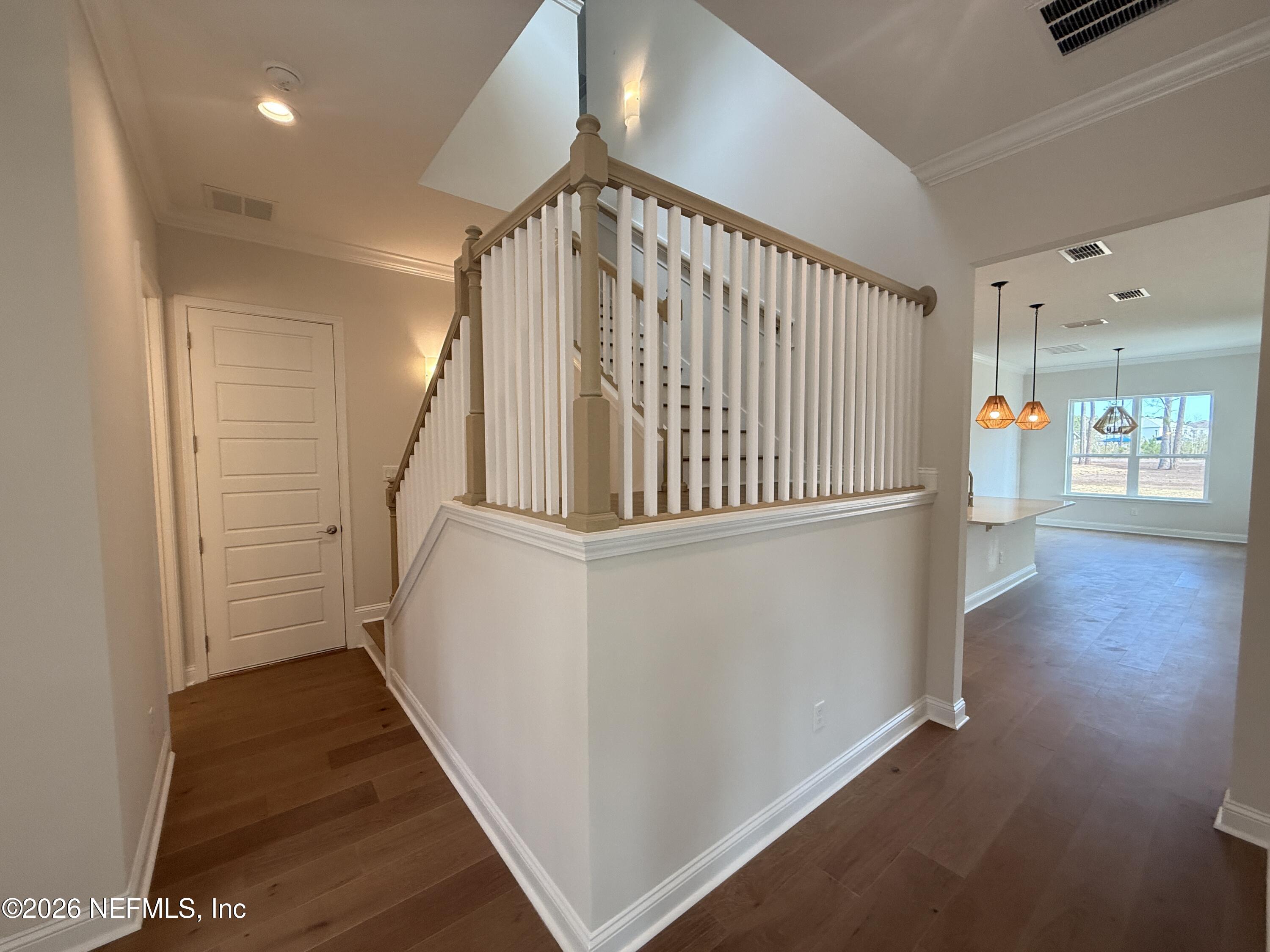 95110 Barnwell Road Fernandina Beach, FL 32034 - Photo 4 of 22 a view of entryway with wooden floor
