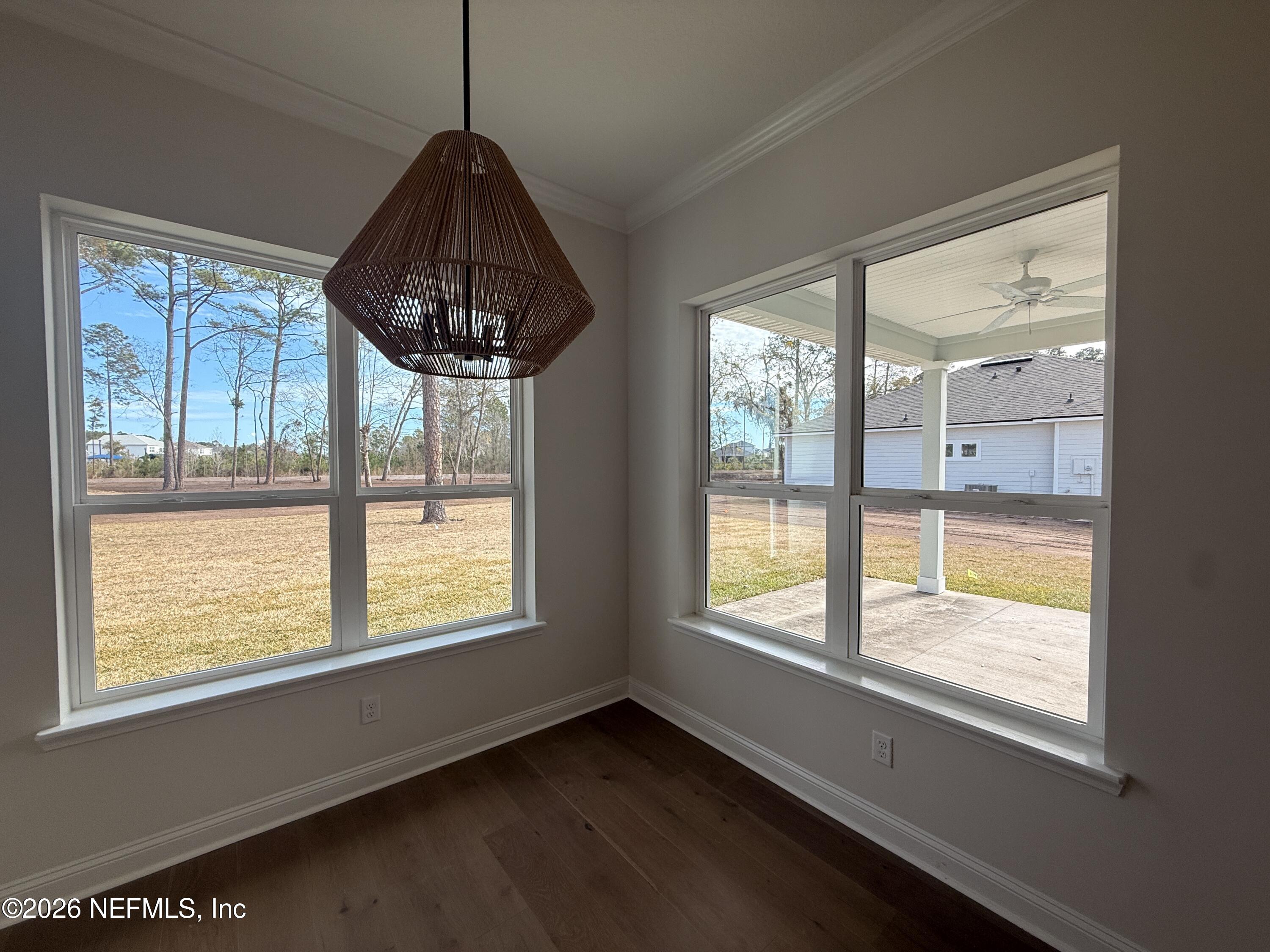 95110 Barnwell Road Fernandina Beach, FL 32034 - Photo 10 of 22 a bedroom with a bed and a window