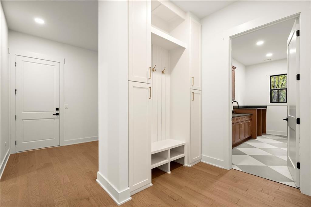145 Highlands Chase Ball Ground, GA 30107 - Photo 28 of 79 a view of a big room with wooden floor and windows