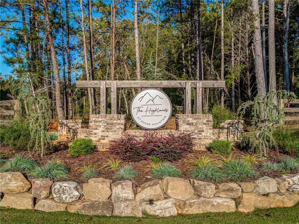 145 Highlands Chase Ball Ground, GA 30107 - Photo 72 of 79 a clock tower in the middle of a yard