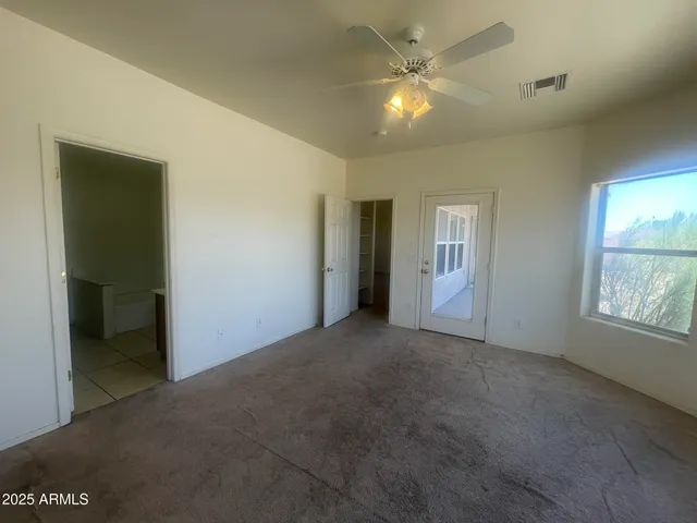 a bathroom with a bathtub sink and mirror