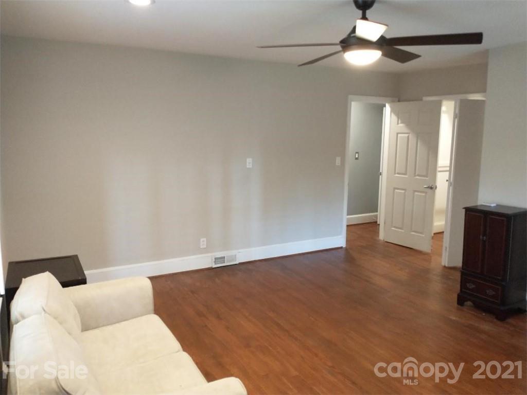 3634 Park Road Charlotte, NC 28209 - Photo 9 of 15 a view of livingroom with hardwood floor and ceiling fan