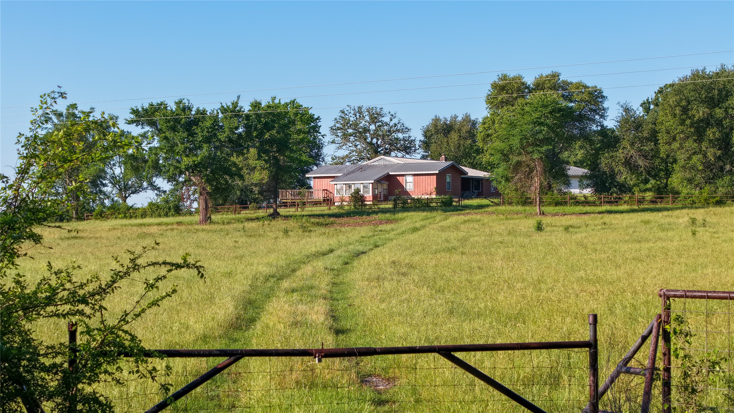 3765 Poteet Road Normangee, TX 77871 - Photo 20 of 37 a view of a swimming pool with an outdoor seating and yard