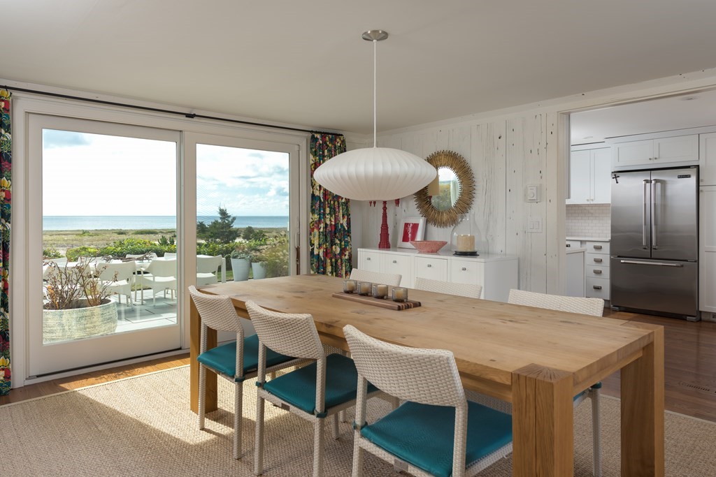 25 Davis Lane Harwich, MA 02646 - Photo 11 of 21 a view of a dining room with furniture window and outside view