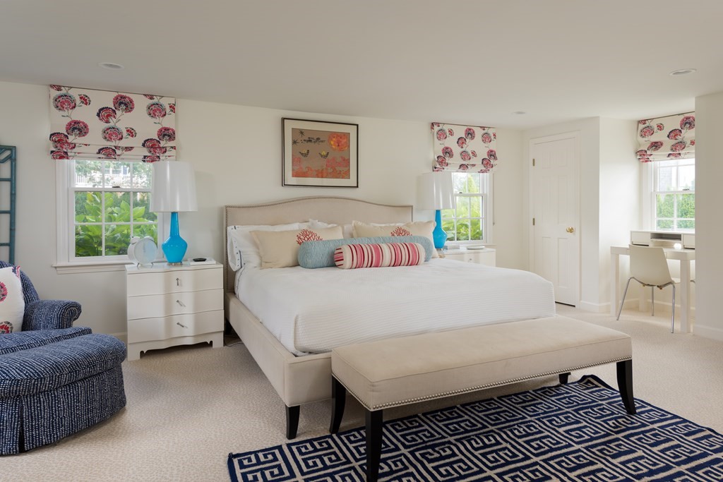 25 Davis Lane Harwich, MA 02646 - Photo 14 of 21 a bed room with a bed and a couch