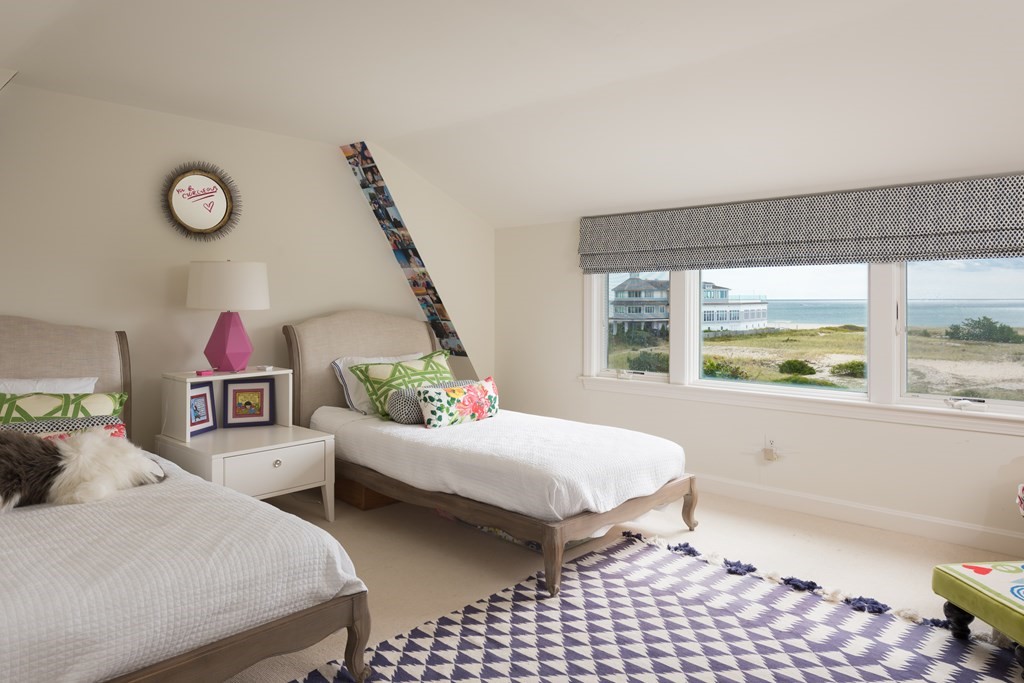 25 Davis Lane Harwich, MA 02646 - Photo 16 of 21 a bedroom with furniture and a window