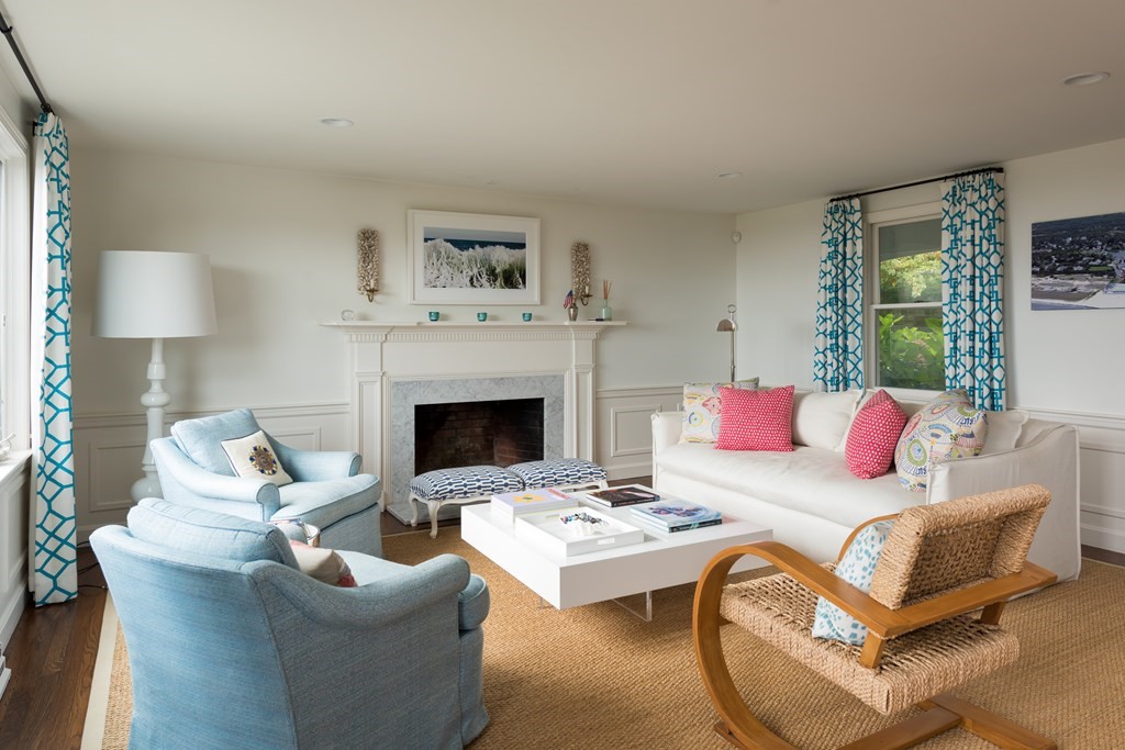 25 Davis Lane Harwich, MA 02646 - Photo 7 of 21 a living room with furniture and a fireplace