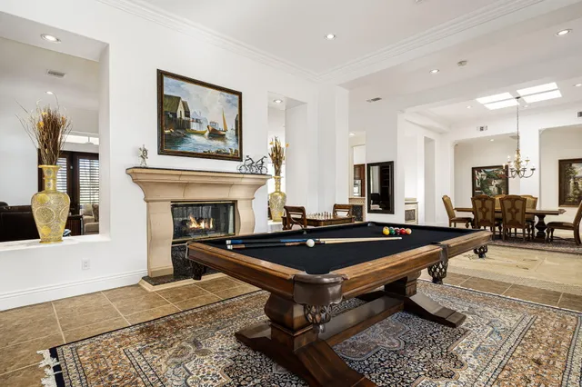 a view of a chairs and tables in the patio